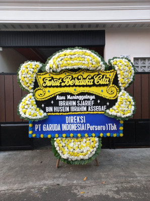 Papan Bunga Duka di Siding