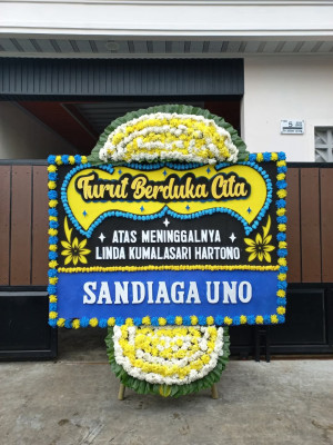 Papan Bunga Duka di Siding
